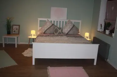 Ein Bett oder Betten in einem Zimmer der Unterkunft Ferienwohnung Nink