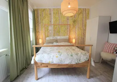Ein Bett oder Betten in einem Zimmer der Unterkunft FerienNest Bad Ems, Appartment WaldNest