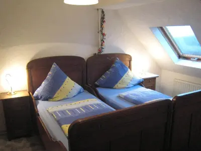 Ein Bett oder Betten in einem Zimmer der Unterkunft Cozy Morbach Getaway