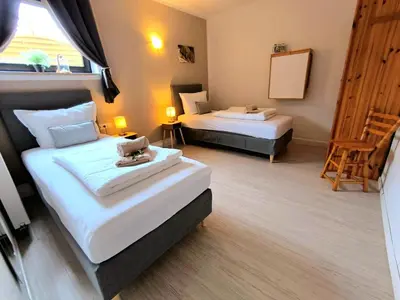 Ein Bett oder Betten in einem Zimmer der Unterkunft Ferienwohnung 