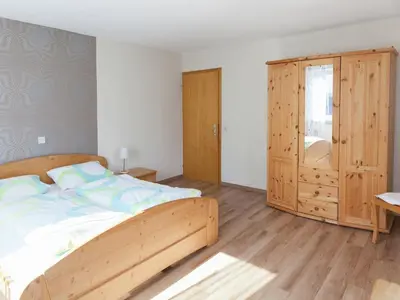 Ein Bett oder Betten in einem Zimmer der Unterkunft Farmhouse Escape in Haserich