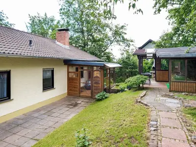 Ein Garten an der Unterkunft Feusdorf Forest Bungalow