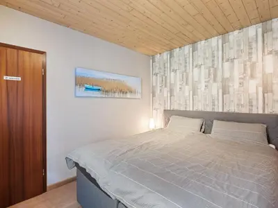 Ein Bett oder Betten in einem Zimmer der Unterkunft Feusdorf Forest Bungalow
