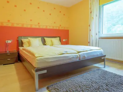 Ein Bett oder Betten in einem Zimmer der Unterkunft Waxweiler Riverside Retreat