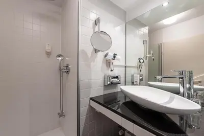 Ein Badezimmer in der Unterkunft Jagdschloss Hotel Niederwald