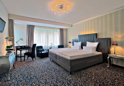 Ein Bett oder Betten in einem Zimmer der Unterkunft Top Hotel Krämer