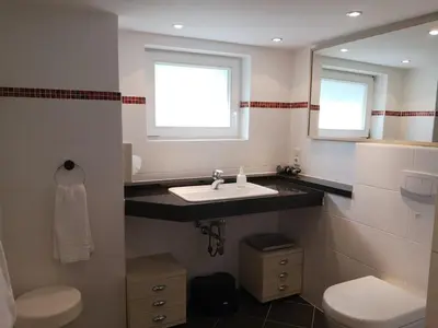 Ein Badezimmer in der Unterkunft Hotel Hegenbarths