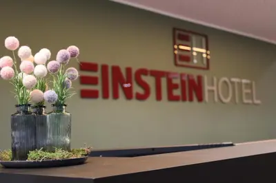 Ein Zertifikat, Auszeichnung, Logo oder anderes Dokument, das in der Unterkunft EINSTEIN Hotel am Römerpark ausgestellt ist