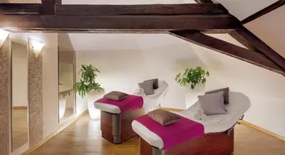 Ein Sitzbereich in der Unterkunft Nells Park Hotel