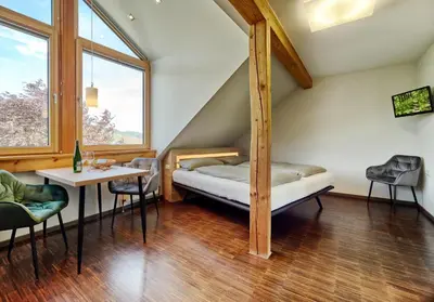 Ein Bett oder Betten in einem Zimmer der Unterkunft Weingut Schumann