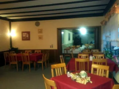 Ein Restaurant oder anderes Speiselokal in der Unterkunft Hotel-Restaurant Zum Stern