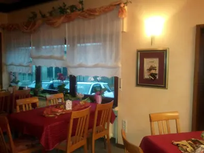 Ein Sitzbereich in der Unterkunft Hotel-Restaurant Zum Stern