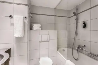 Ein Badezimmer in der Unterkunft Vienna House Easy by Wyndham Trier