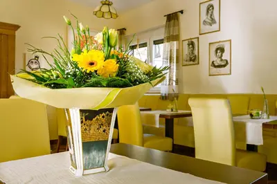 Ein Restaurant oder anderes Speiselokal in der Unterkunft Ferien Weingut Schneider