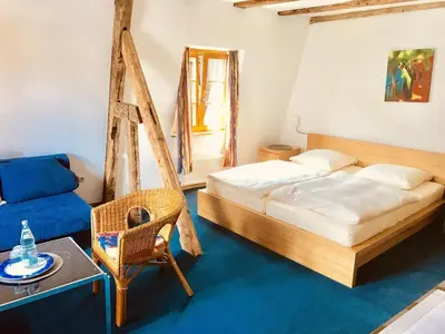 Ein Bett oder Betten in einem Zimmer der Unterkunft Hotel Weingut Dehren