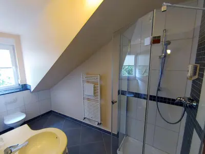 Ein Badezimmer in der Unterkunft AKZENT Hotel Berg's Alte Bauernschänke- Wellness und Wein