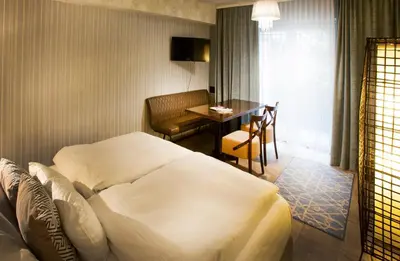 Ein Bett oder Betten in einem Zimmer der Unterkunft Bad Emser Hof