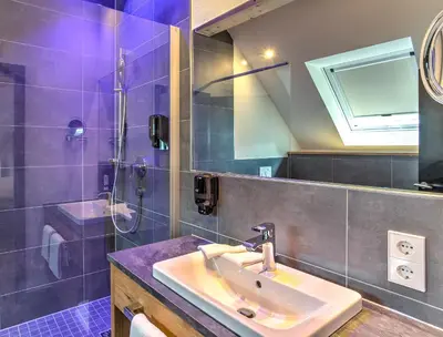 Ein Badezimmer in der Unterkunft Hotel am Hafen