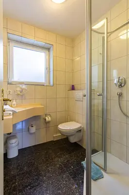 Ein Badezimmer in der Unterkunft Hotel Villa Tummelchen