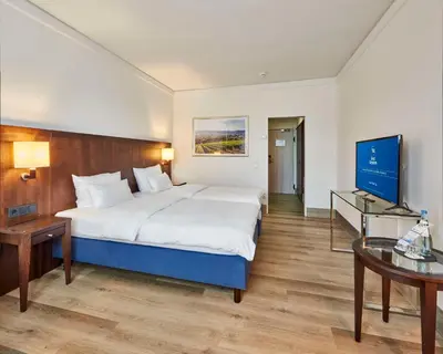 Ein Bett oder Betten in einem Zimmer der Unterkunft Best Western Hotel Trier City