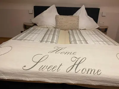 Ein Bett oder Betten in einem Zimmer der Unterkunft Pension Mona Lisa