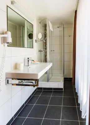 Ein Badezimmer in der Unterkunft Beim Weinbauer