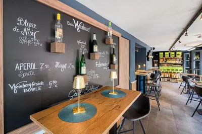 Ein Restaurant oder anderes Speiselokal in der Unterkunft Beim Weinbauer