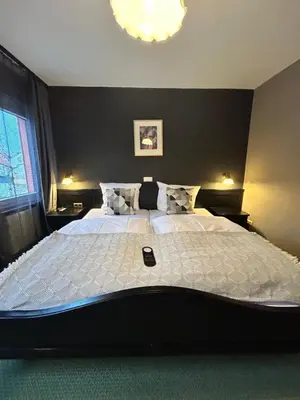 Ein Bett oder Betten in einem Zimmer der Unterkunft Hotel Alter Posthof