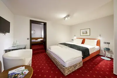 Ein Bett oder Betten in einem Zimmer der Unterkunft Hotel zur Post