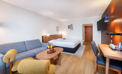 Ein Bett oder Betten in einem Zimmer der Unterkunft Wyndham Garden Lahnstein Koblenz