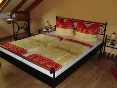 Ein Bett oder Betten in einem Zimmer der Unterkunft Ferienwohnung Sommer