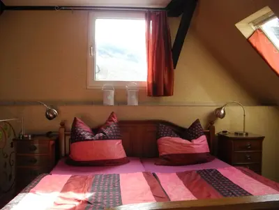 Ein Bett oder Betten in einem Zimmer der Unterkunft Altes Winzerhaus