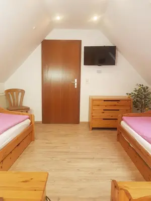Ein Bett oder Betten in einem Zimmer der Unterkunft Komfort Ferienhaus FEWO70