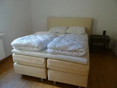 Ein Bett oder Betten in einem Zimmer der Unterkunft Haus Moezelblik - schöne Aussicht am Mosel