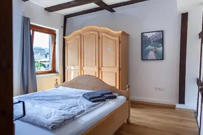 Ein Bett oder Betten in einem Zimmer der Unterkunft Fachwerkhäuschen