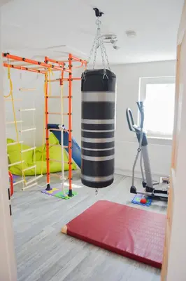 Das Fitnesscenter und/oder die Fitnesseinrichtungen in der Unterkunft Ferienwohnung Landquartier