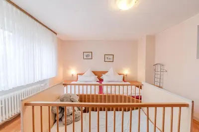 Ein Bett oder Betten in einem Zimmer der Unterkunft Ferienhaus Störzel Wohnung A