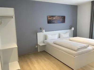 Ein Bett oder Betten in einem Zimmer der Unterkunft Hotel-Fritz