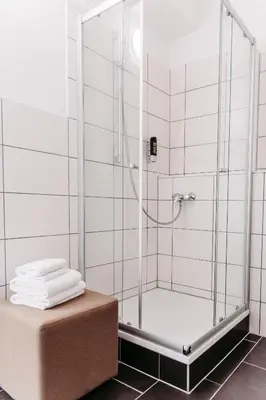 Ein Badezimmer in der Unterkunft bestprice Hotel Koblenz