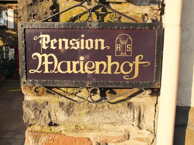 Ein Zertifikat, Auszeichnung, Logo oder anderes Dokument, das in der Unterkunft Pension Marienhof ausgestellt ist