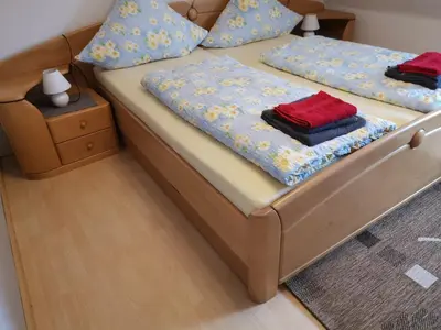 Ein Bett oder Betten in einem Zimmer der Unterkunft Lisa