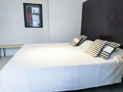 Ein Bett oder Betten in einem Zimmer der Unterkunft Alte Schule Gästehaus - Fräulein Apartment