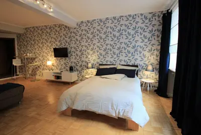 Ein Bett oder Betten in einem Zimmer der Unterkunft FerienNest Bad Ems, Appartment RankenNest