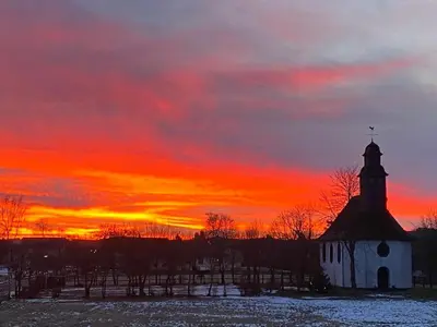 Blick auf den Sonnenuntergang/Sonnenaufgang von der Ferienwohnung aus oder aus der Nähe