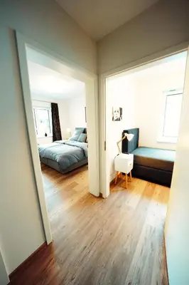 Ein Bett oder Betten in einem Zimmer der Unterkunft Ferienwohnungen schulerundmeyer