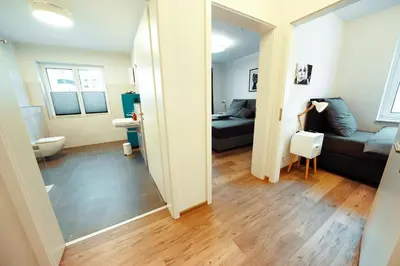 Ein Bett oder Betten in einem Zimmer der Unterkunft Ferienwohnungen schulerundmeyer