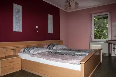 Ein Bett oder Betten in einem Zimmer der Unterkunft Ferienhaus an der Mosel