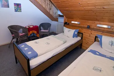 Ein Bett oder Betten in einem Zimmer der Unterkunft Hotel Kugel