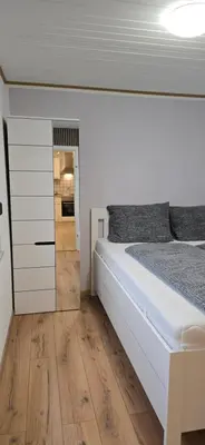 Ein Bett oder Betten in einem Zimmer der Unterkunft Ferienwohnung Nikolaus