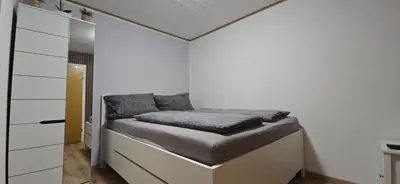 Ein Bett oder Betten in einem Zimmer der Unterkunft Ferienwohnung Nikolaus
